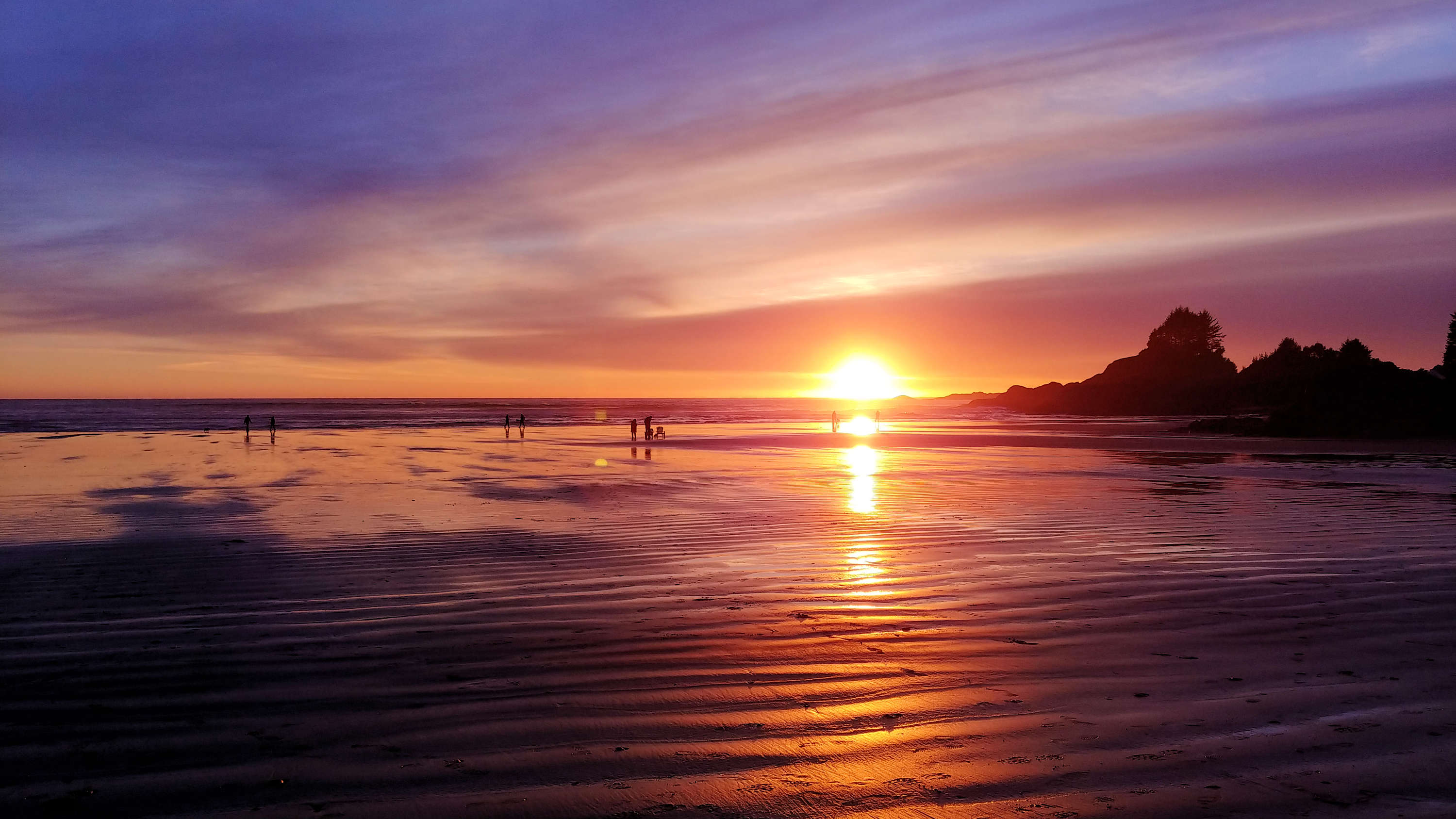 Sunset at Cox Bay Beach in Tofino, British Columbia.