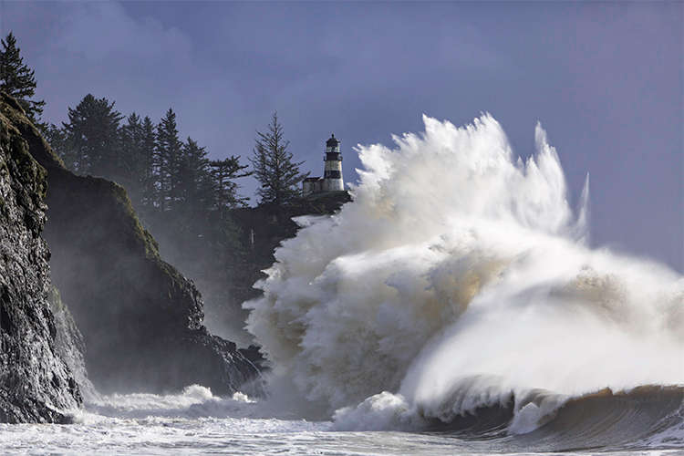 Waves crashing at Cape Disappointment in Long Beach, Washington.