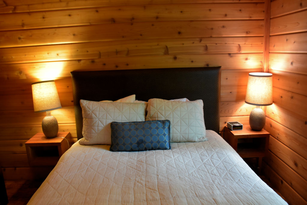 Cabin bedroom at Snug Harbor Resort.