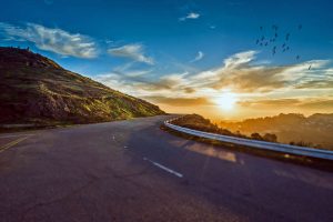 Winding road with a sunset.