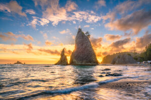 sunset over rialto beach with a haystack in the center, one of the best washington beaches