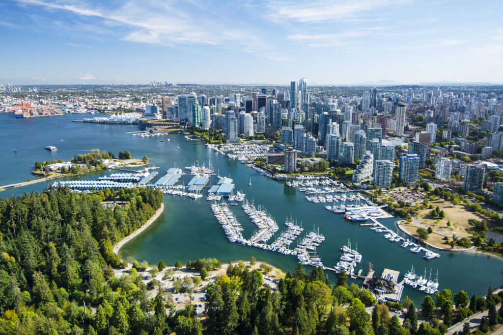 om above with the harbor in the foreground and city skyline in the background