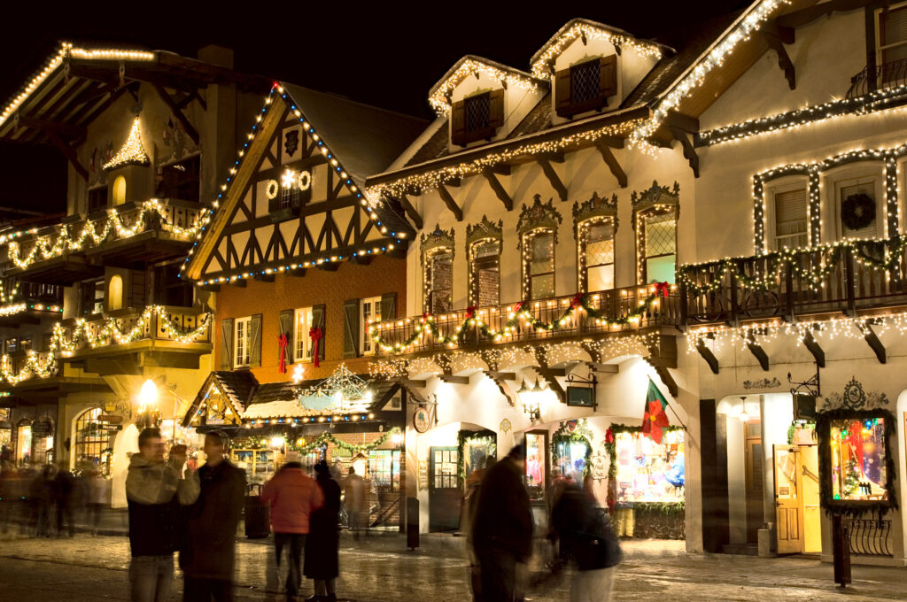 leavenworth in winter at night with christmas lights on the buildings