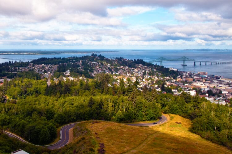 astoria oregon with winding road in the foreground