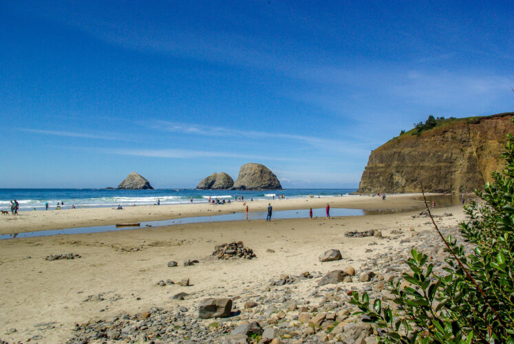 group of people on rockaway beach in oregon