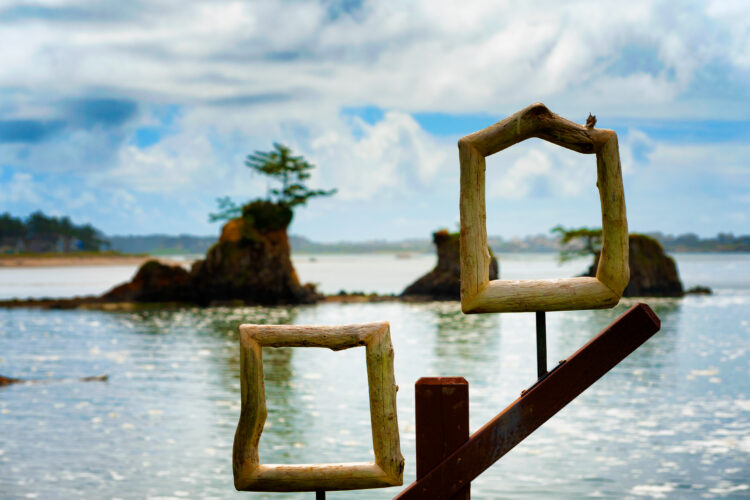 2 wooden windows built along the water in lincoln city oregon