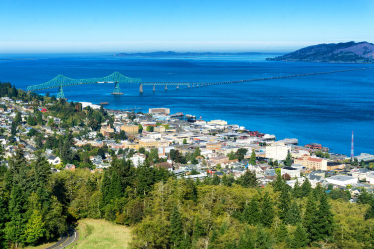 View from above Astoria Oregon looking over the beachside city and the bridge