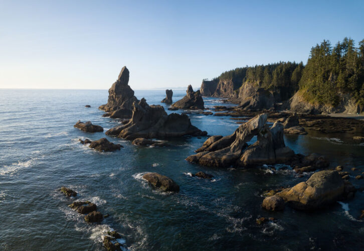 Beautiful aerial view of a scenic landscape at the Ocean Coast, with rock formations in the Pacific Ocean. Taken at Shi Shi Beach in Neah Bay, West of Seattle, Washington, United States of America.
