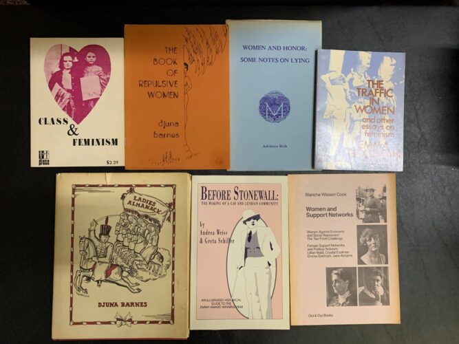 a selection of used books on feminism