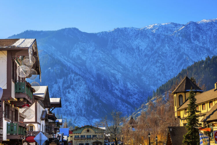 The scenic Bavarian mountain town of Leavenworth Washington with a mountain above it