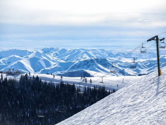 Snowy mountain getaway in Idaho with ski lift and snow